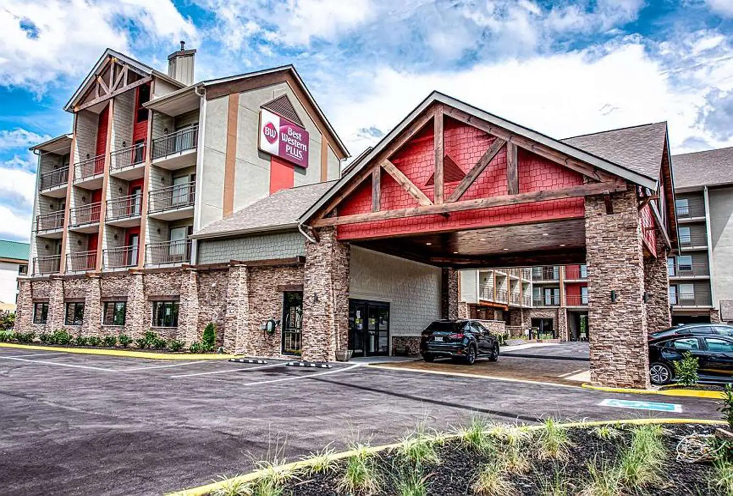 Best Western Plus Apple Valley Lodge exterior with Smoky Mountains in background